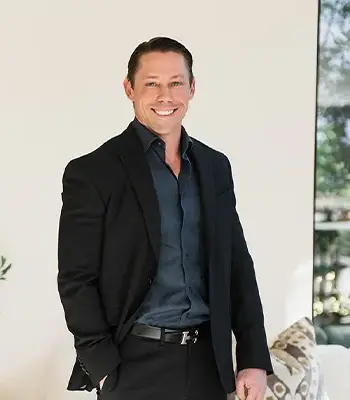 Portrait of Adam Walker, Broker Associate.