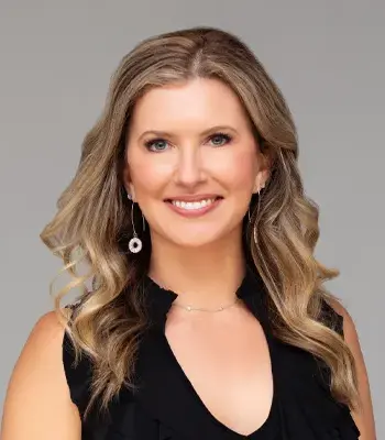 Portrait of Alicia Kelley Leschber, ABR, CNE, AHWD, CHMS, CRS, Broker Associate.
