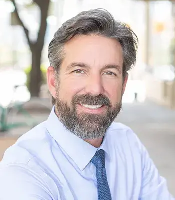 Portrait of Dax Oglesby, REALTOR®.