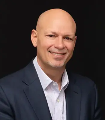 Portrait of Kevin Haines, REALTOR®,  ABR, SRS, CNE, Veteran.