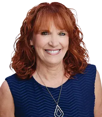 Portrait of Maureen Vance, REALTOR®.