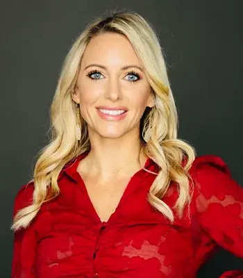 Portrait of Melody Somerville, REALTOR®.