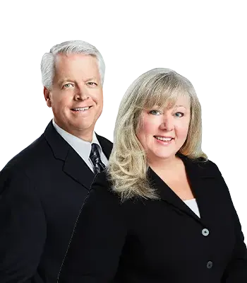 Portrait of Jeffrey and Gina Nyland Team, REALTORS®.