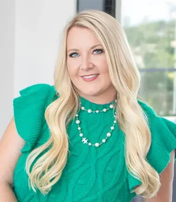 Portrait of Sarah McAloon, REALTOR®.
