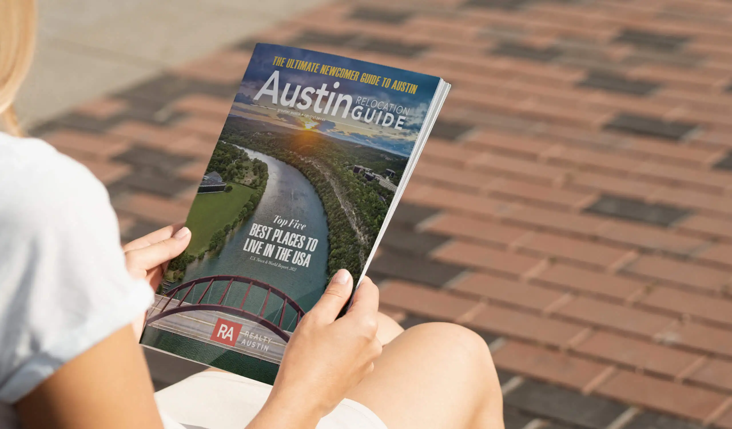 Woman browsing relocation guide provided by Realty Austin