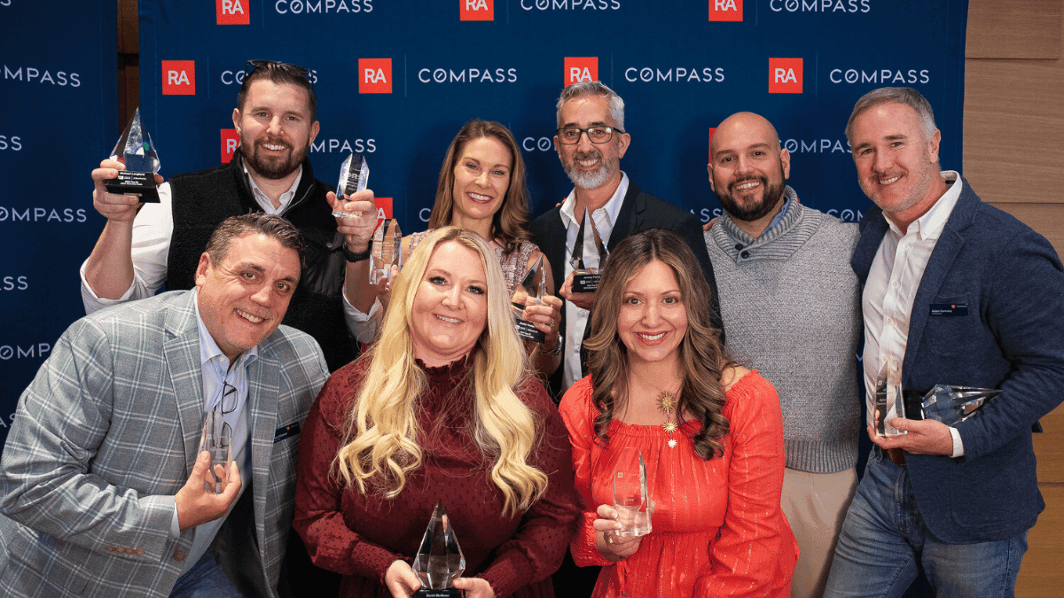 Realty Austin team receiving an award